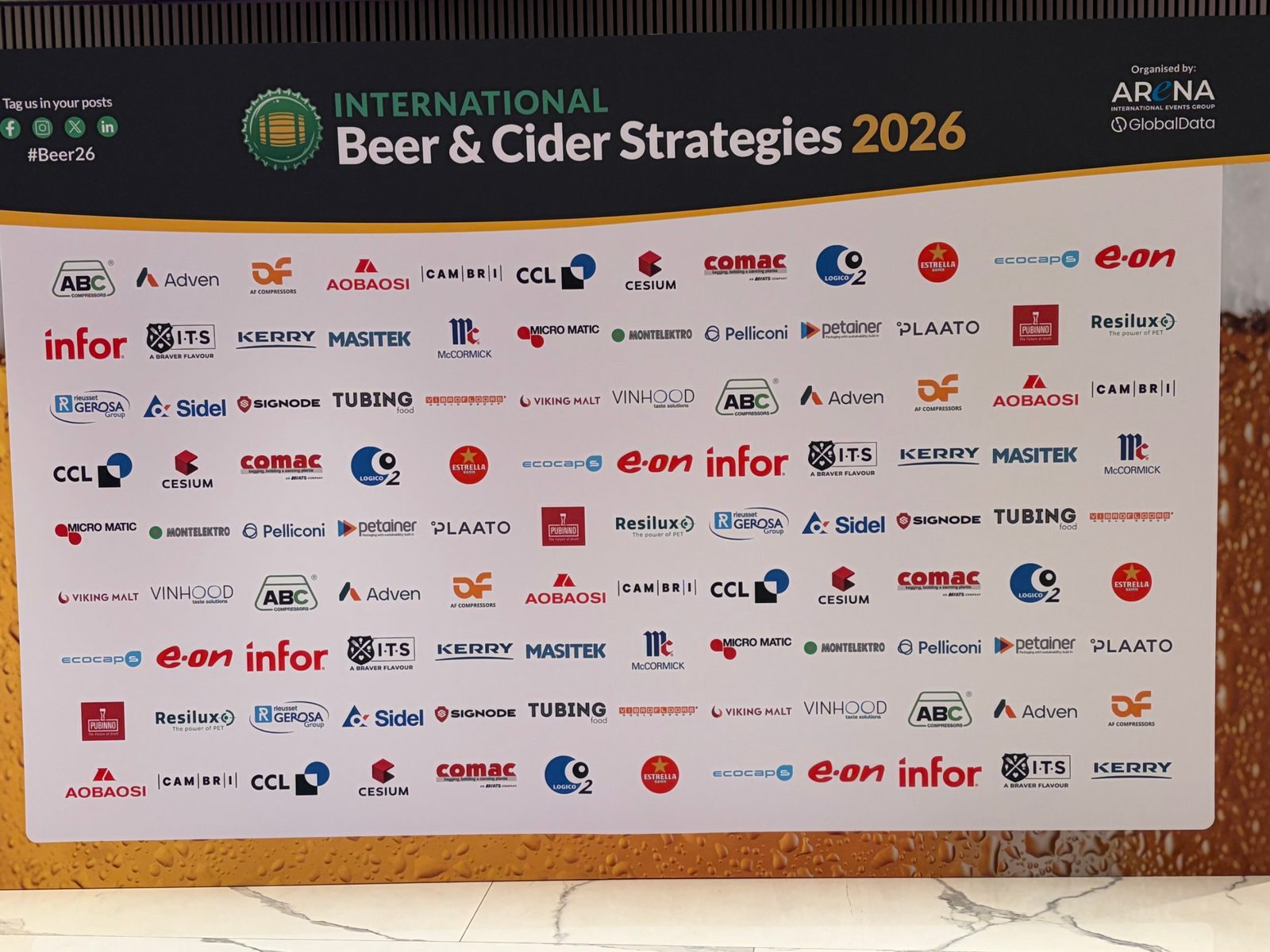 Sponsor wall at International Beer & Cider Strategies 2026 with the AOBAOSI logo